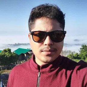 A man in sunglasses and a red shirt, Monoarul Islam, Senior Web Developer at Rankupper.